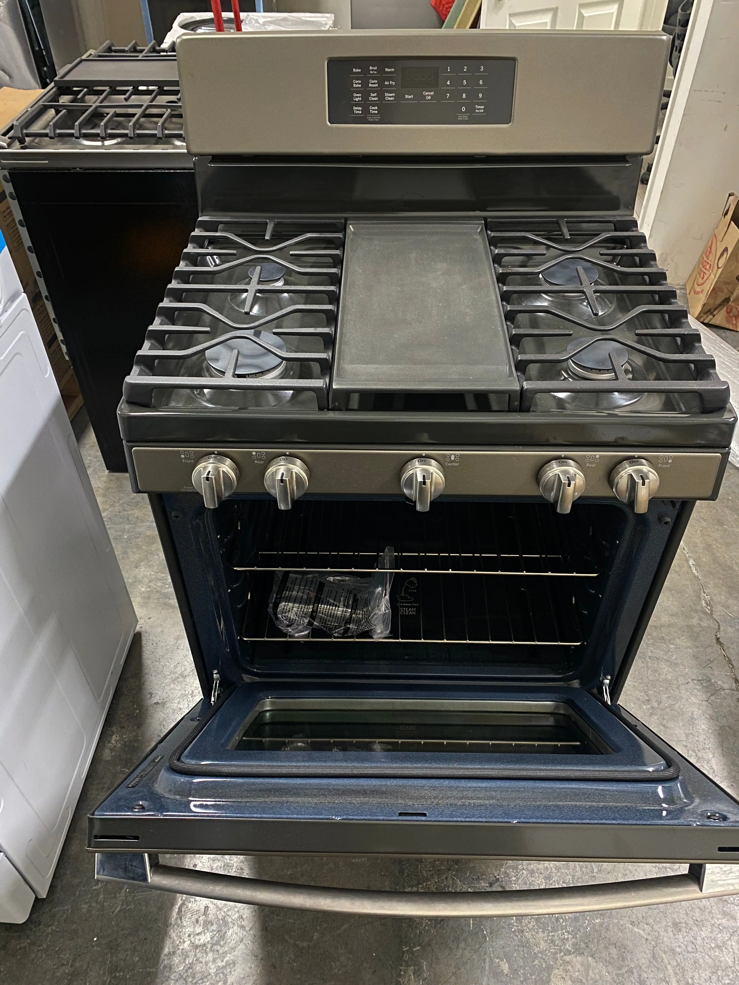 GE JGB735EPES 30 Inch Freestanding Gas Convection Range with 5 Sealed Burners, 5 Cu. Ft. Oven Capacity, Storage Drawer, Edge-to-Edge Cooktop, Self-Clean Steam Clean, Integrated Griddle, and Center Oval Burner: Fingerprint Resistant Slate